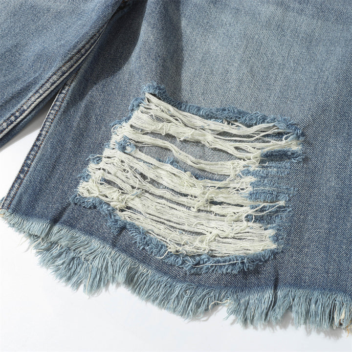 Ripped washed denim five quarter pants