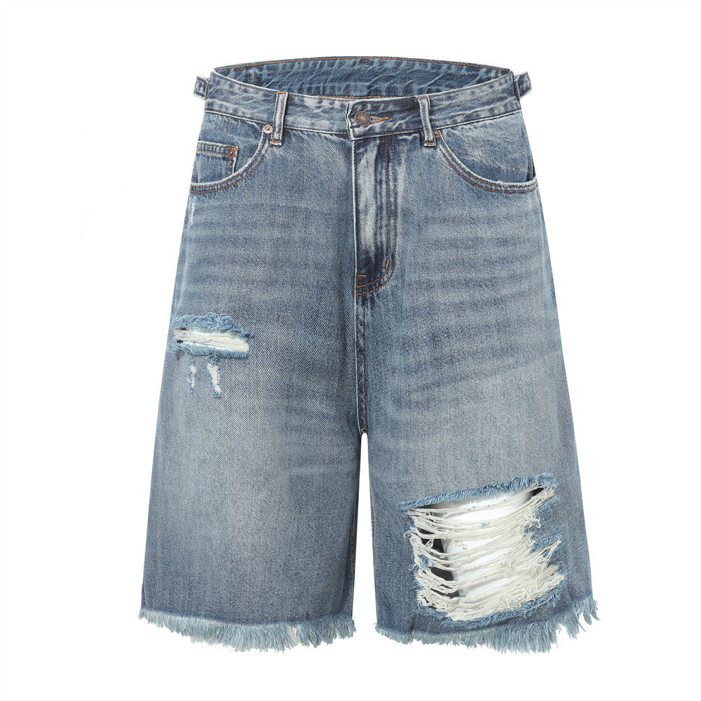 Ripped washed denim five quarter pants