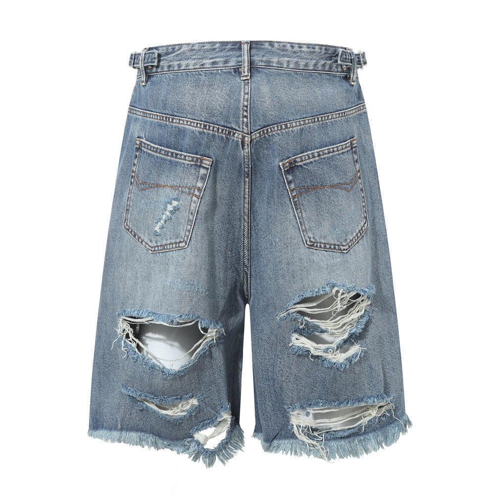 Ripped washed denim five quarter pants